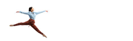 Side view of smiling ballerina jumping isolated on white, banner