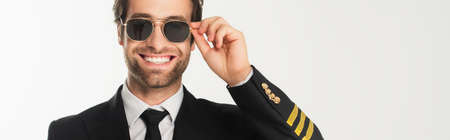 Smiling aviator in sunglasses isolated on white, banner