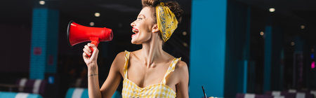 side view of pin up woman screaming in megaphone, banner