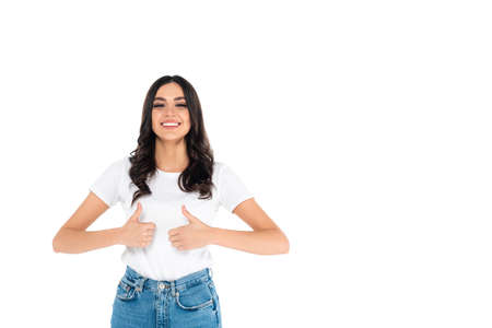 happy asian woman looking at camera and showing thumbs up isolated on whiteの写真素材