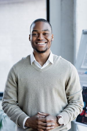 african american man standing with clenched hands