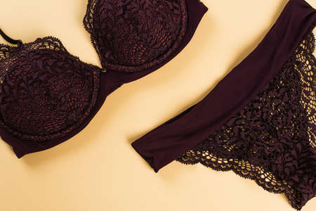 Top view of lace lingerie on beige backgroundの写真素材