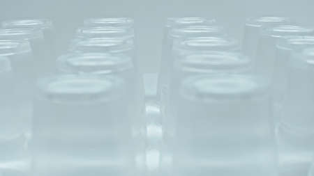 close up of stacked plastic cups isolated on greyの写真素材