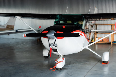 modern helicopter with propeller and airfoils on parking