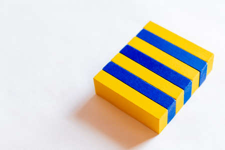 top view of blue and yellow rectangular blocks on white background, ukrainian conceptの写真素材