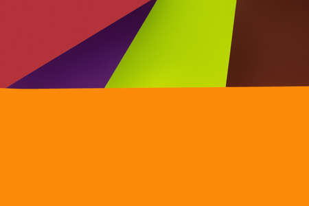 multicolored geometric background with orange copy space