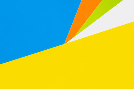 simple blue, yellow, orange, white and green polygonal backgroundの写真素材