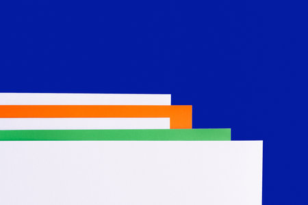 abstract background with multicolored paper and blue copy spaceの写真素材