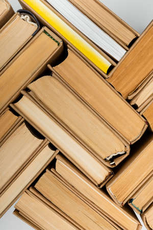 top view of paper books collection isolated on grayの写真素材