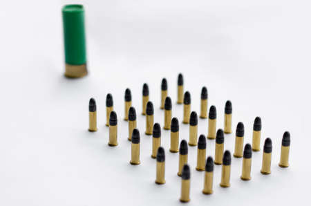set of bullets on white with blurred backgroundの写真素材
