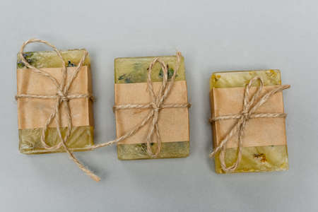 Top view of handmade soap on grey background
