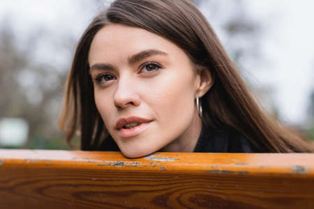 portrait of young and pretty woman looking away