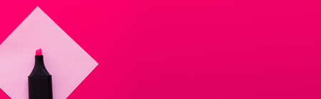 top view of marker pen near blank paper note isolated on pink, banner