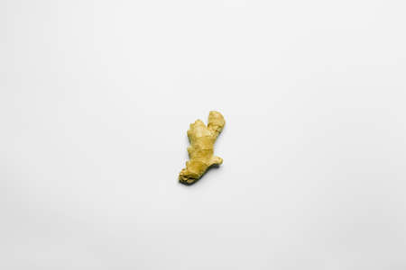 Top view of ripe ginger on white backgroundの写真素材