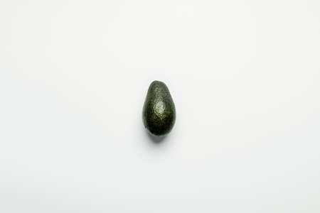 Top view of organic avocado on white backgroundの写真素材