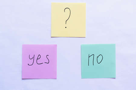 top view of cards with question mark above yes and no words on white backgroundの写真素材