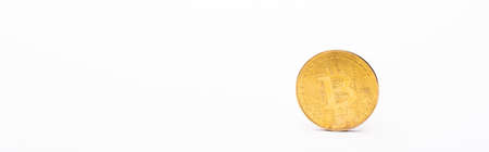 KYIV, UKRAINE - APRIL 26, 2022: Golden crypto coin on white background, bannerのeditorial素材