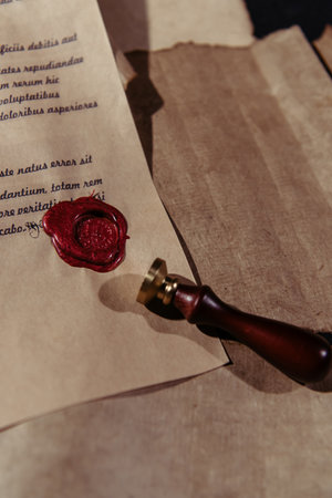 top view of medieval manuscript with wax seal on parchment sheets