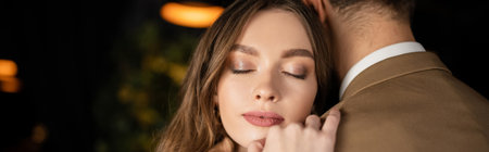 pretty woman with closed eyes hugging man on valentines day, banner