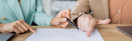 partial view of managers working with business analytics in office, banner