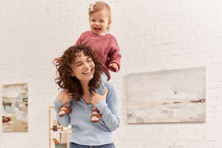 quality time, happiness, work and life harmony, cheerful woman with excited baby girl on shoulders,...