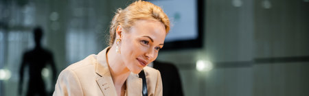blonde woman in suit smiling in hotel, hotel industry, travel, formal wear, successful businesswoman...