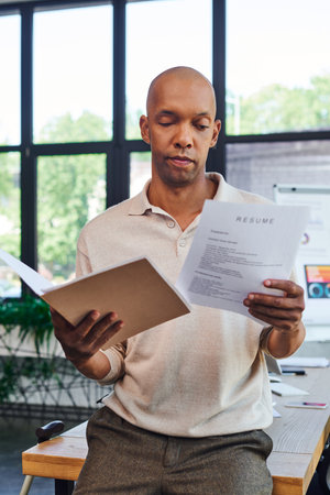 dark skinned man with myasthenia gravis disease holding resume and folder, bold african american...