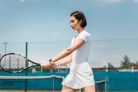 forehand, motivation and sport, portrait of woman holding tennis racquet, athletic female playerの写真素材