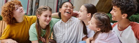 banner, happy african american woman hugging with teenage students, diversity, teacher, smileの写真素材