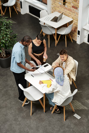 coworking, happy african man gesturing near colleagues, business people discussing startup project