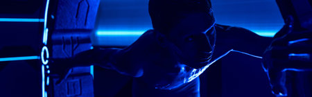 scientific experiment, alien near high-tech device in discovery center, futuristic concept, bannerの写真素材