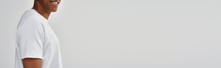 fashionable african american male model in casual white t-shirt, copy space for advertising, bannerの写真素材