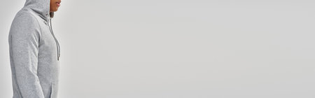 elegant young african american man in casual sweatshirt, copy space for advertising, bannerの写真素材