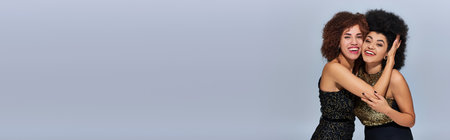 pretty happy african american women in festive attires partying together, fashion concept, bannerの写真素材