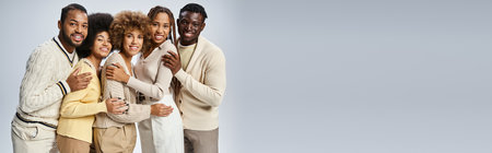 banner of happy african american people standing in elegant attire on grey background, Juneteenth