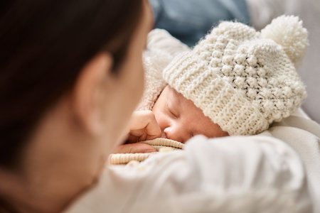 good looking woman in cozy casual attire breastfeeding her cute newborn child, modern parenting