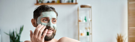 handsome jolly man with beard and face mask chilling in his bathtub, mental health awareness, bannerの写真素材