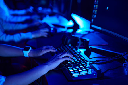 cropped shot of female hands, young gamer using computer keyboard while playing game, cybersportの写真素材