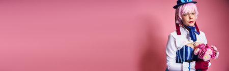 beautiful female cosplayer in vibrant costume holding pink flowers and looking at camera, banner