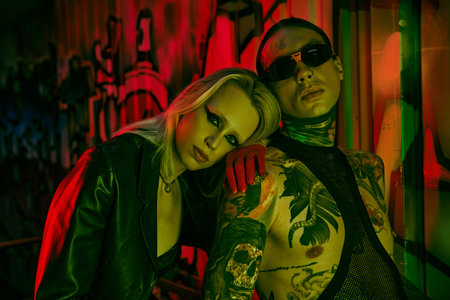 Two people posing for a picture at a lively rave partyの写真素材