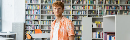 A man exploring a vast bookshelf in a quiet library.