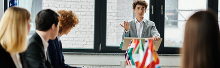 Teenagers participate in a Model UN simulation, debating international issues.の写真素材
