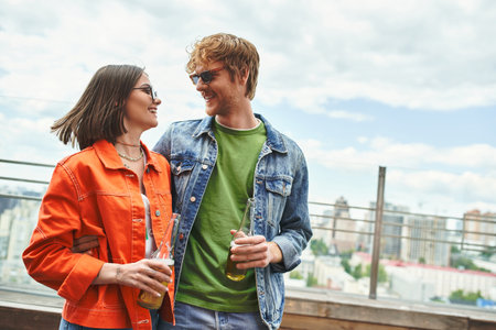 A man and a woman standing together, side by sideの写真素材