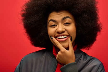 Stylish African American woman smiles for the camera.の写真素材