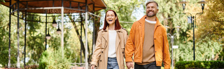 Two men strolling together on a city street.の写真素材