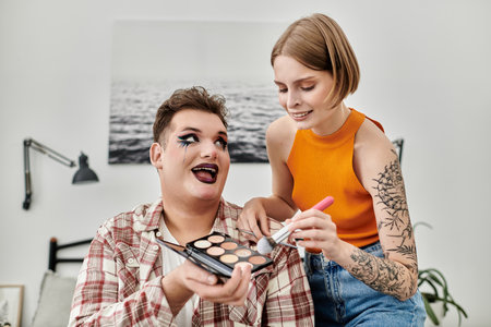 A vibrant duo enjoying creativity and connection while applying makeup together.の写真素材