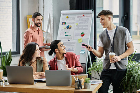 Team members converse in a stylish workspace.