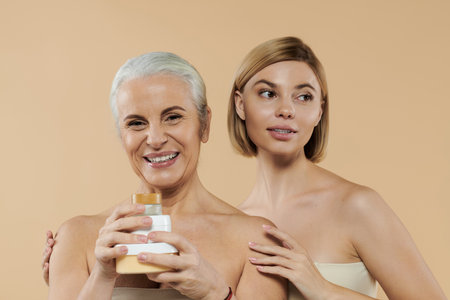 A joyful moment shared between a mother and her daughter radiating love and beauty.の写真素材
