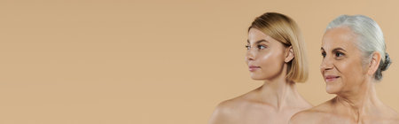 A proud mother and daughter share a moment of connection and beauty.の写真素材