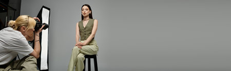 Woman seated before photographer.の写真素材